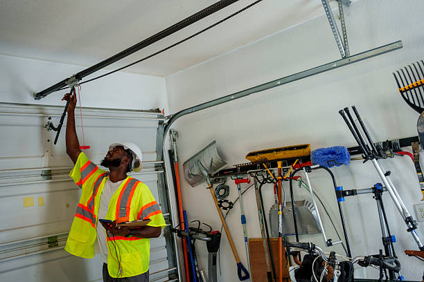Professional Garage Door Panel Replacement technician working in Durand, WI